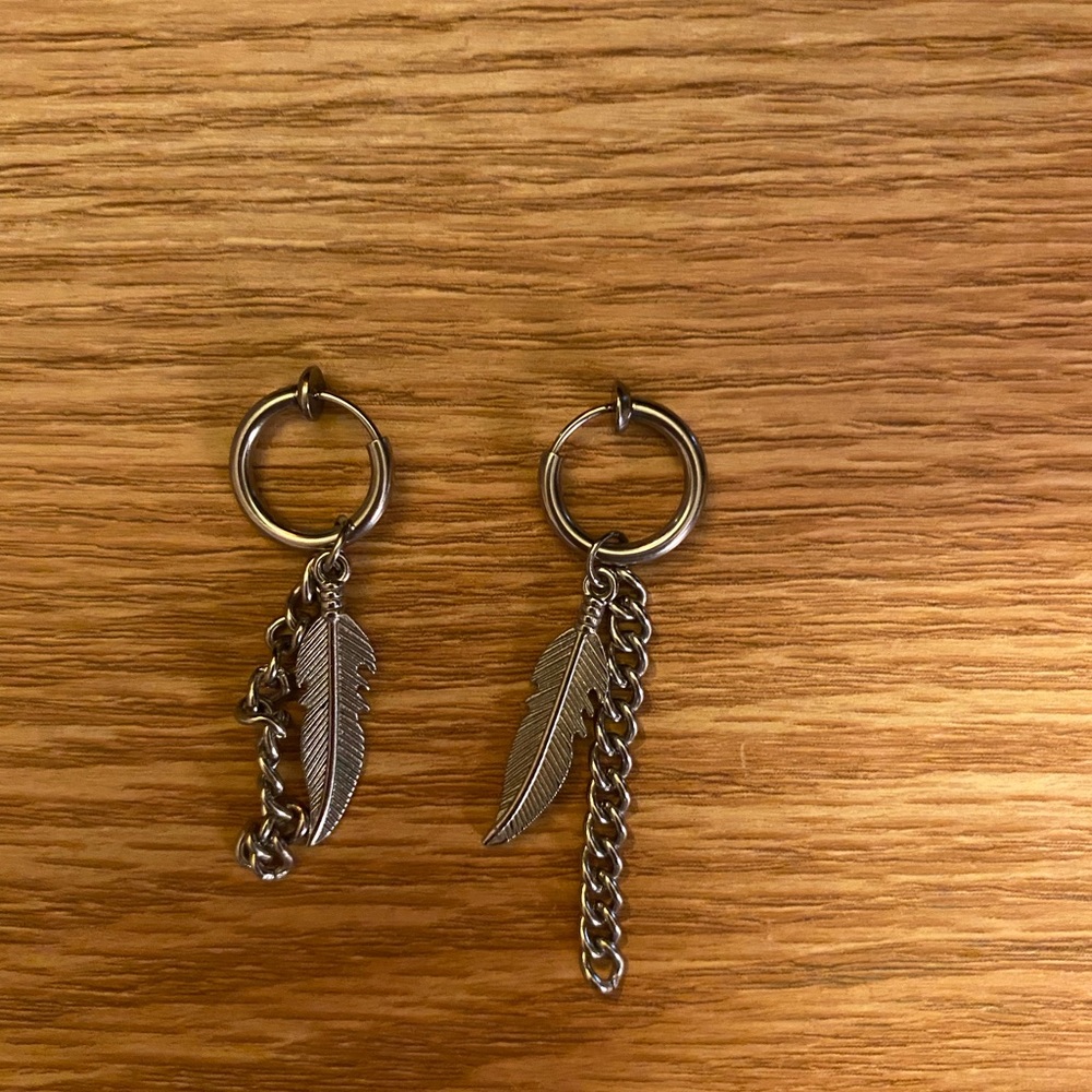 Clip on earrings one feather